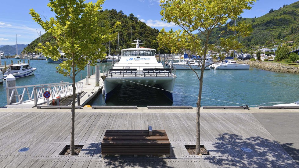 Front on view of MV Odyssea launch docked at Picton Marina used for group and charter cruises, at the top of New Zealand's South Island.